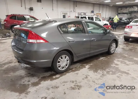 2010 Honda Insight Lx z USA, uszkodzony, nr VIN JHMZE2H58AS038570